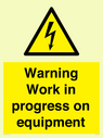 warning-work-in-progress-on-equipmentwith-electrical-hazard-symbol~
